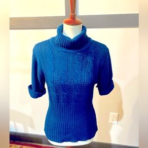 Cable knit turtle neck sweater